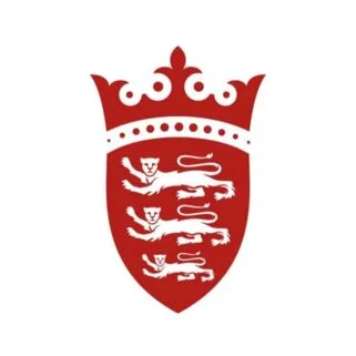Red shield with three white lions, crown above.