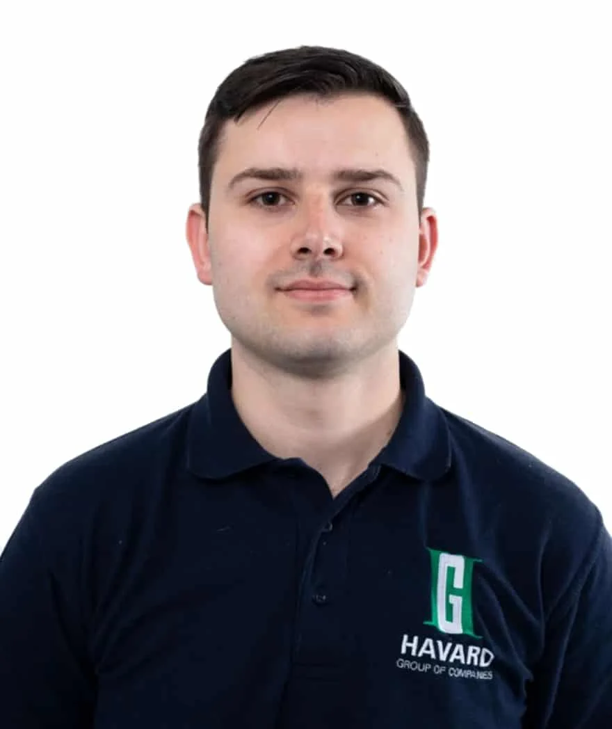 Man in navy polo shirt, white background.